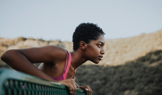 Woman working out and challenging herself.