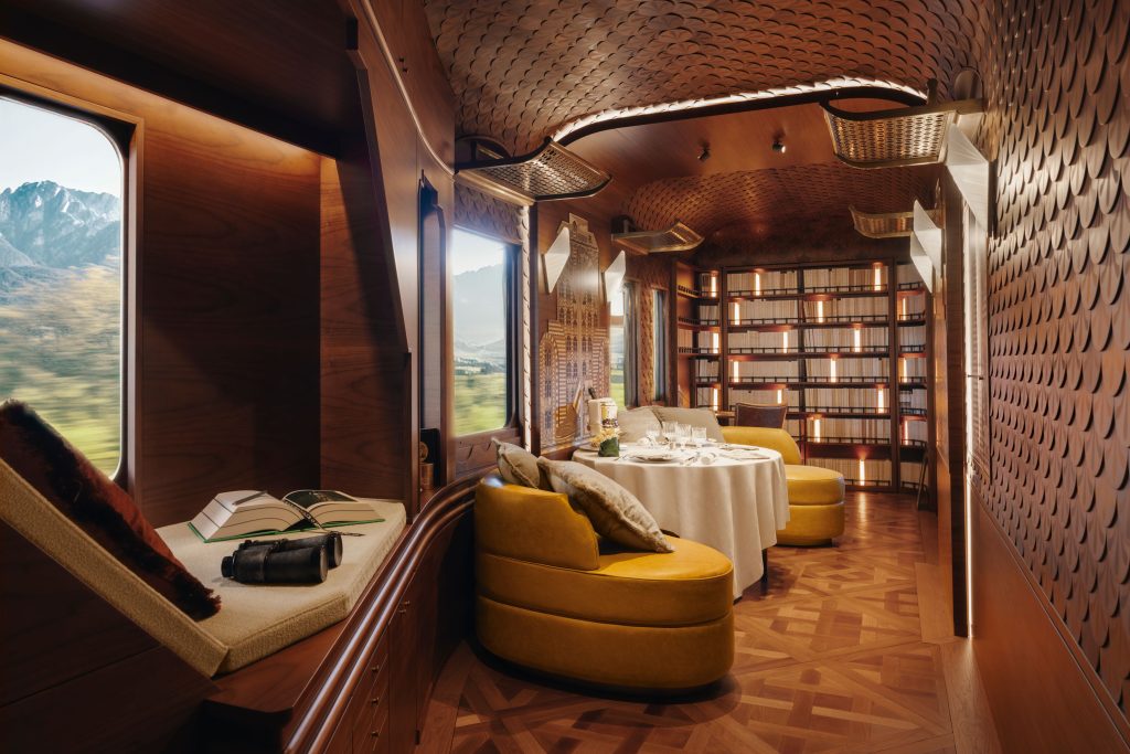 The L'Observatoire features a library for guests to unwind and taken in the view while riding the Venice Simplon Orient Express from Paris to Monte Carlo.